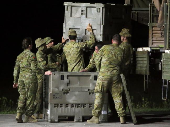 Fresh food and supplies arrive on a A C130 Australian Airforce plane arrives on Christmas Island for the Australian evacuees being held in the detention centre. Picture: Nathan Edwards