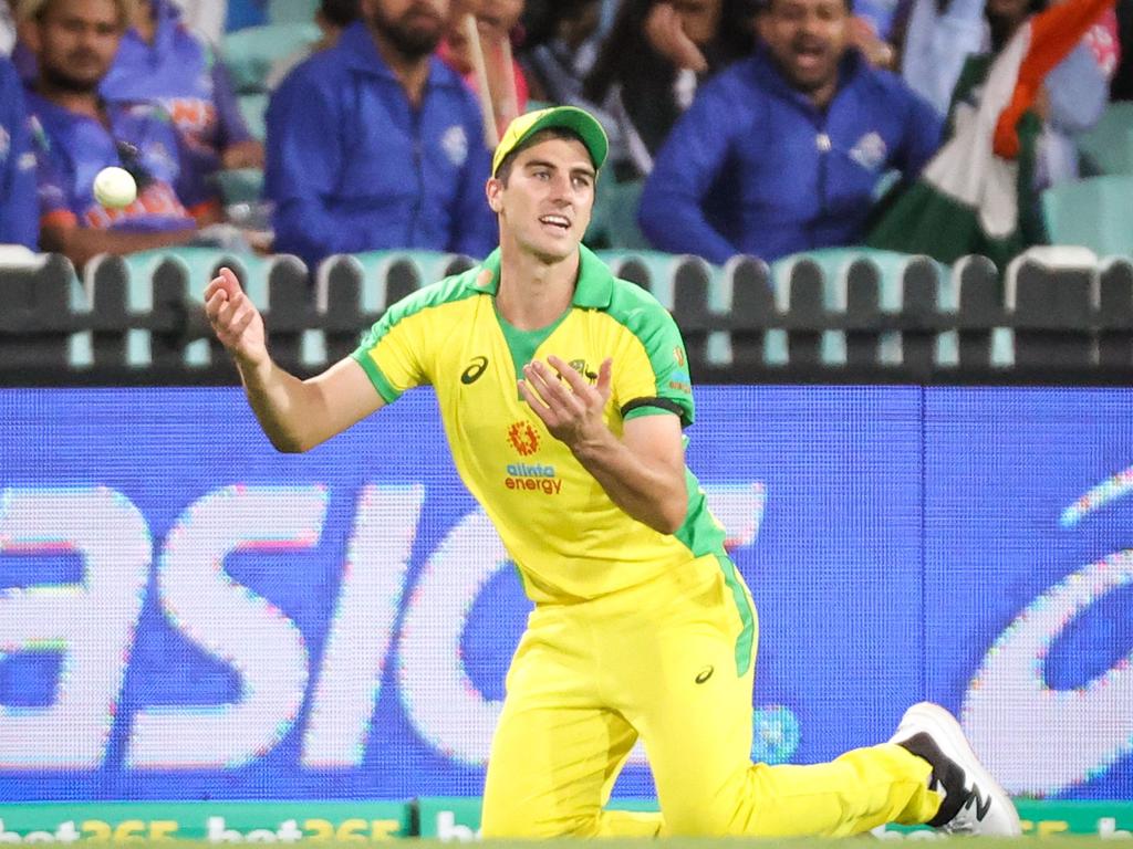 Australia's Pat Cummins misses a catch.