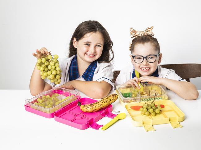 Lunchbox shock findings.L-R: Nevaeh, 9 and Harmony, 6 McInnes-Ball from Mudgeeraba packing healthy lunchboxes.Picture: NIGEL HALLETT