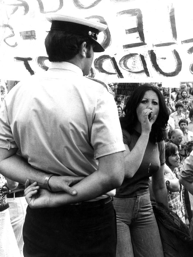 1975: A police officer keeps watch at a pro-Gough Whitlam rally in the City Square, Melbourne, in the aftermath of the Dismissal. Governor-General Sir John Kerr dismissed the Labor Prime Minister on November 11. File picture