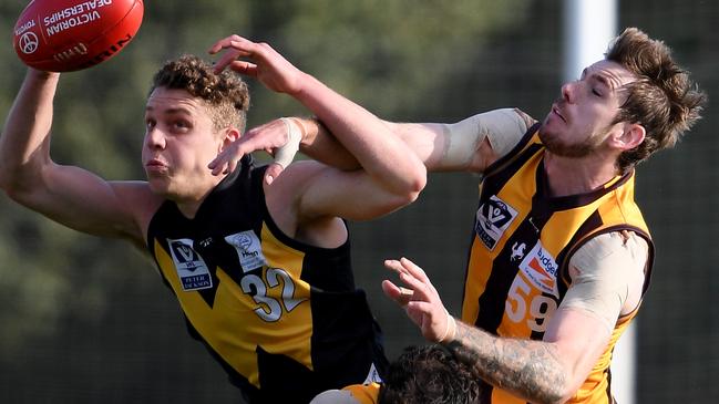 Josh Corbett is spoiled by Kaiden Brand in the VFL. Picture: Andy Brownbill