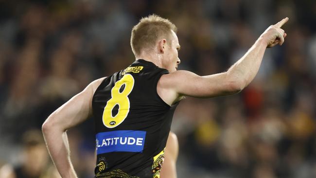 MELBOURNE, AUSTRALIA - MAY 21: Jack Riewoldt of the Tigers celebrates a goal  during the round 10 AFL match between the Richmond Tigers and the Essendon Bombers at Melbourne Cricket Ground on May 21, 2022 in Melbourne, Australia. (Photo by Darrian Traynor/Getty Images)