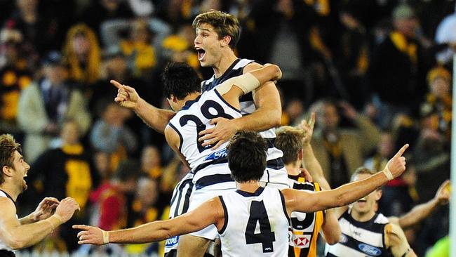 Tom Hawkins celebrates after his long-bomb on the siren gave the Cats a win for the ages against Hawthorn in 2012. Picture: George Salpigtidis