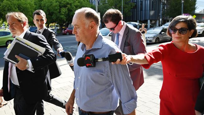 Former Renewal SA chief executive John Hanlon outside Adelaide Magistrates Court on Wednesday after his first court appearance. Picture: AAP / David Mariuz