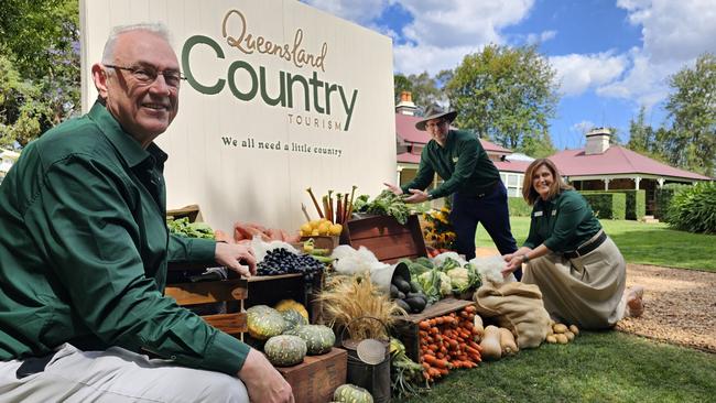 Unveiling the new branding for Queensland Country Tourism at Gabbinbar Homestead are chief executive Peter Homan (left), deputy chair Louise Sturgess and chair Geoff McDonald.