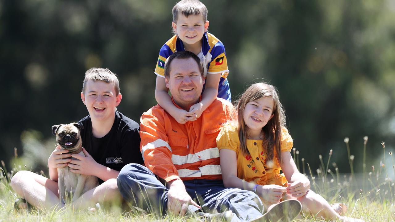 Miner Dave Hartley pictured with his children from Bailey 14, Xavier, 8, and Tamika, 11, at home in Muswellbrook. Picture: Sue Graham