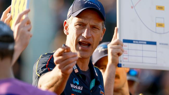 Matthew Clarke chats to his players at quarter time. Picture: James Elsby/AFL Photos via Getty Images