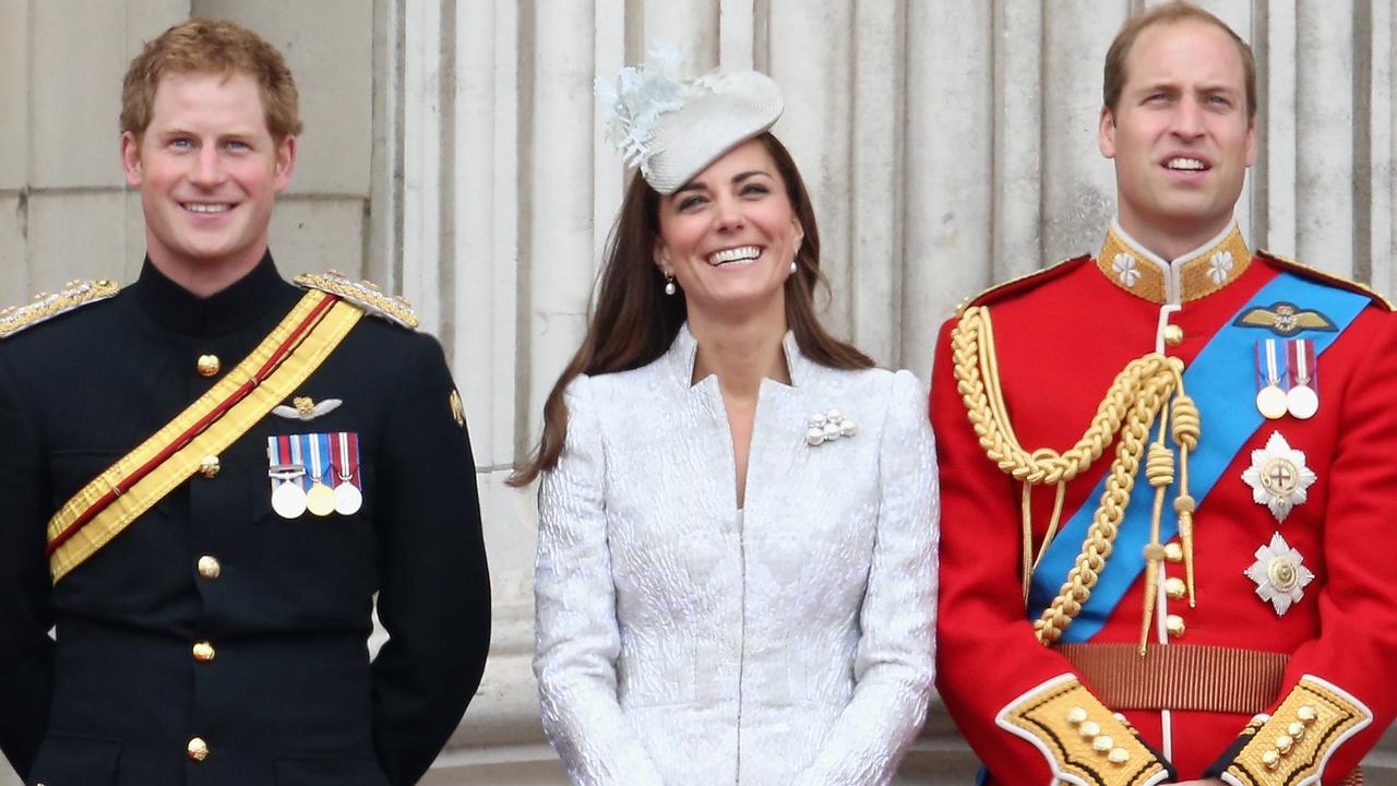 A smiling Prince Harry, Catherine, Duchess of Cambridge and Prince William, Duke of Cambridge at the Queen’s birthday parade in 2014. Picture: Chris Jackson/Getty Images