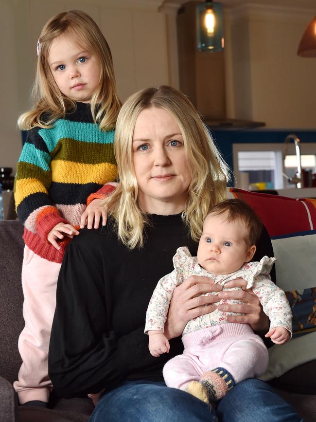 Lucy Carrigg, with daughters Zoe, two-and-a-half, and Billie, nine weeks, has missed out on super while taking parental leave. Picture: Nicki Connolly