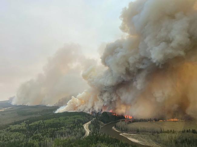 A smoke column rises from wildfire EWF-035 near Shining Bank, Alberta, Canada, on 5th May, 2023. PICTURE: Alberta Wildfire/Handout via Reuters.