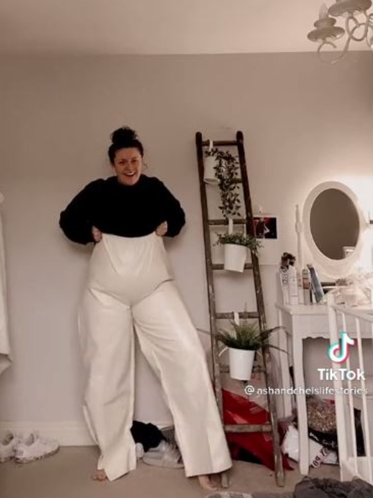 The $14 pants were clearly intended for someone much taller. Picture: TikTok/@ashandchelslifestories