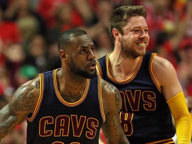 CHICAGO, IL - MAY 10: LeBron James #23 and Matthew Dellavedova #8 of the Cleveland Cavaliers celebrate a win over the Chicago Bulls in Game Four of the Eastern Conference Semifinals of the 2015 NBA Playoffs at the United Center on May 10, 2015 in Chicago, Illinois. The Cavaliers defeated the Bulls 86-84. NOTE TO USER: User expressly acknowledges and agress that, by downloading and or using the photograph, User is consenting to the terms and conditions of the Getty Images License Agreement. (Photo by Jonathan Daniel/Getty Images)