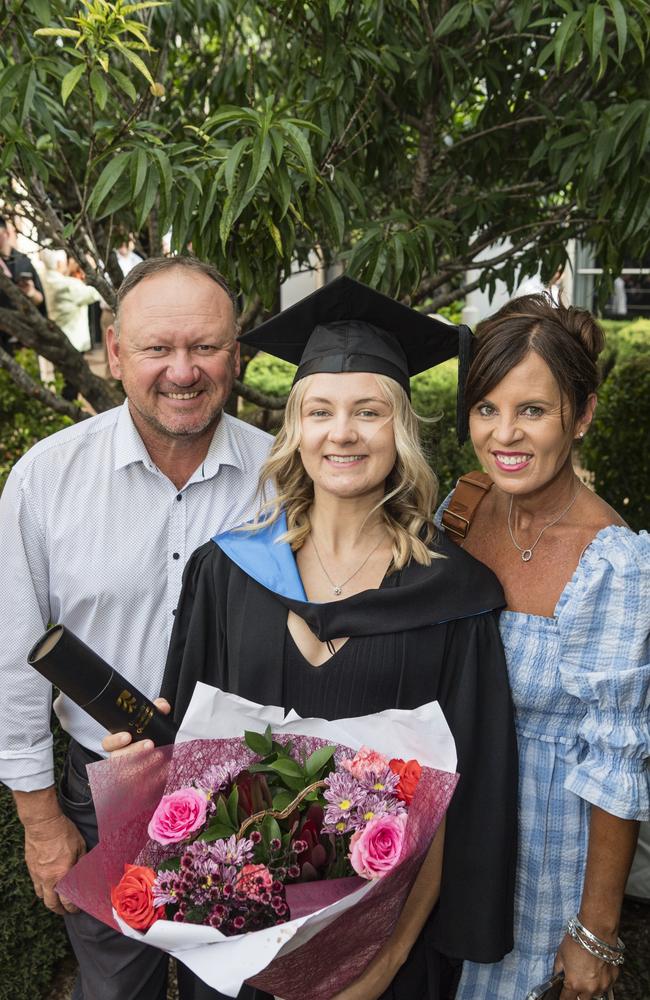 Bachelor of Nursing graduate Taylah Herring with Chris and Shannon Webster at a UniSQ graduation ceremony at Empire Theatres, Tuesday, February 13, 2024. Picture: Kevin Farmer