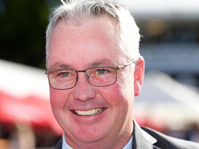 Trainer Tony Pike smiles after Michael Cahill rode The Bostonian to victory in race 5, the QTIS Three-Years-Old Plate, during the Tattersall's Tiara Race Day at Doomben Racecourse in Brisbane, Saturday, June 23, 2018. (AAP Image/Albert Perez) NO ARCHIVING, EDITORIAL USE ONLY