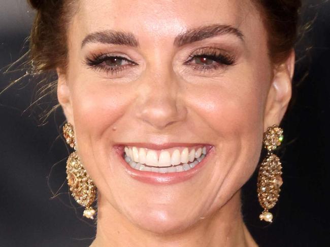 Britain's Catherine, Duchess of Cambridge reacts as she arrives ahead of the World Premiere of the James Bond 007 film "No Time to Die" at the Royal Albert Hall in west London on September 28, 2021. - Celebrities and royals walk the red carpet in central London on Tuesday for the star-studded but much-delayed world premiere of the latest James Bond film, "No Time To Die". (Photo by Chris Jackson / POOL / AFP)