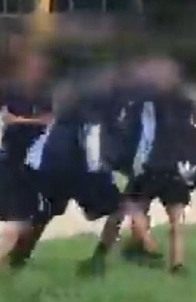 Screenshot from video of Flagstone State Community College students fighting in uniform. Picture: Supplied