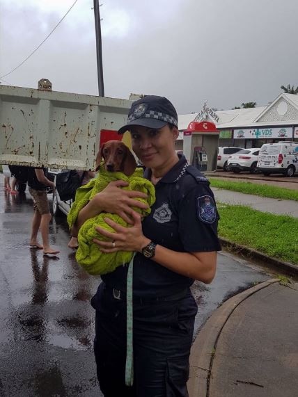 Constable Jennifer Dare with one of the family pets she rescued. Picture: Supplied