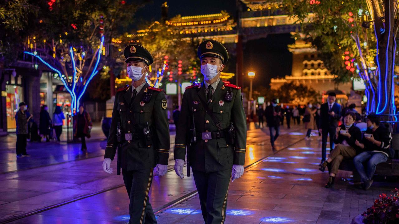 China’s vision of world order is one where Beijing sits at the tops says Bill Hayton. Paramilitary police officers patrol Beijing this month. Picture: Nicolas Asfouri/AFP