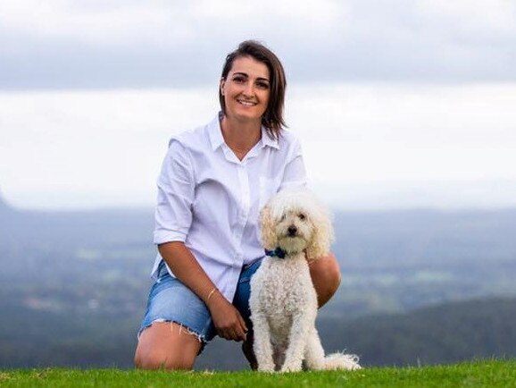 Dejana ‘De’ Durdevic Morooka with mini Poodle, Butso. De is the owner and operator of Sit, Stay and Play. Picture: Tails of Time