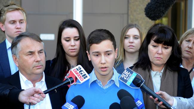 Stuart fronts the media surrounded by parents Ralph and Kathy and family and friends after Thomas’ killer Kieran Loveridge received a longer sentence for the one-punch attack on his brother. Picture: AAP