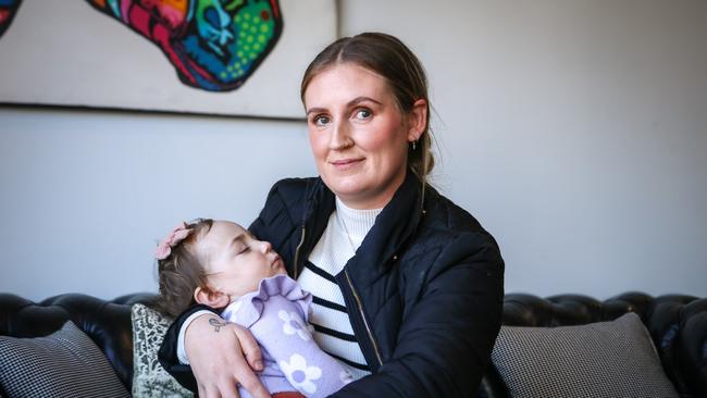 Launceston mother-of-four Maddy McKenna with daughter Hazel Stiboy, is sharing her heartbreaking story of losing son Archie to raise awareness and funds for research into pediatric cancer. Picture: Stephanie Dalton