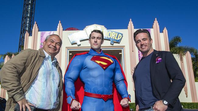 Gold Coast Mayor Tom Tate, a performer dressed as Superman and Village Roadshow CEO Clark Kirby pose for photos at the entrance of Warner Bros. Movie World on July 15 when it reopened to the public.