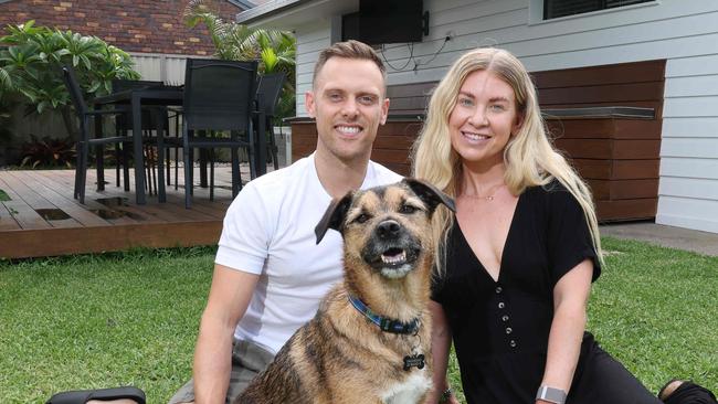 Ryan Davies and his wife Chloe Cowan, with their dog Hugo, have just moved to the Gold Coast from the UK and secured a rental at Burleigh Waters which attracted 100 applicants. Picture Glenn Hampson