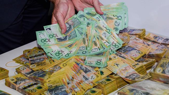 $1.8 million cash seized during Operation Ironside South Australian arrests. Picture: Brenton Edwards