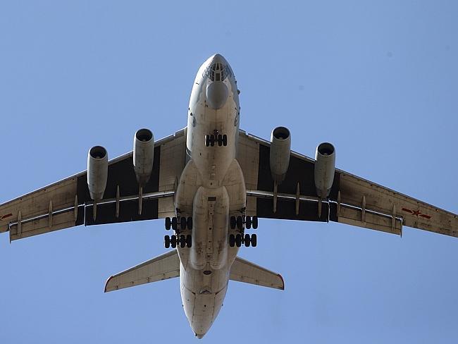 Big guns ... a Chinese Ilyushin IL-76 aircraft flies over Perth returning from search operations. 