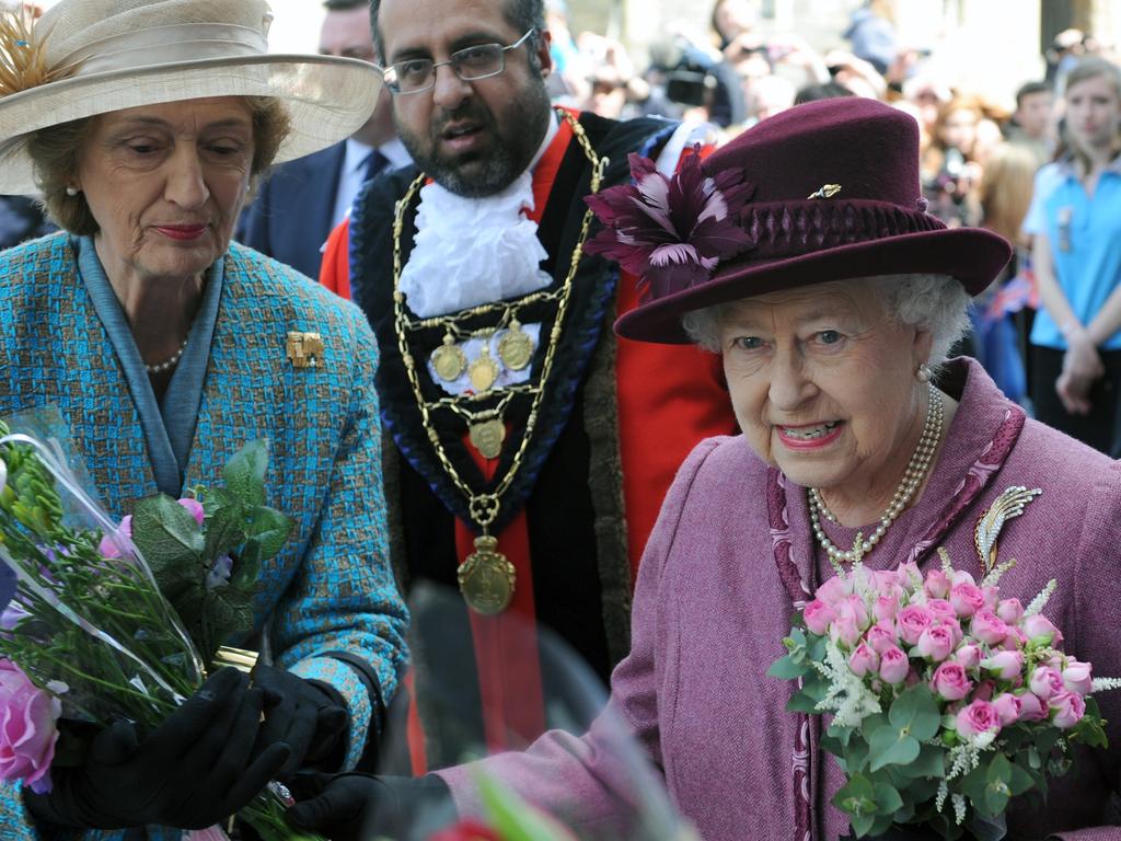 Queen Elizabeth ll, accompanied by her lady-in-waiting, Lady Susan Hussey during a walkabout to mark her Diamond Jubilee in 2012 in Windsor, England. Picture: WireImage.