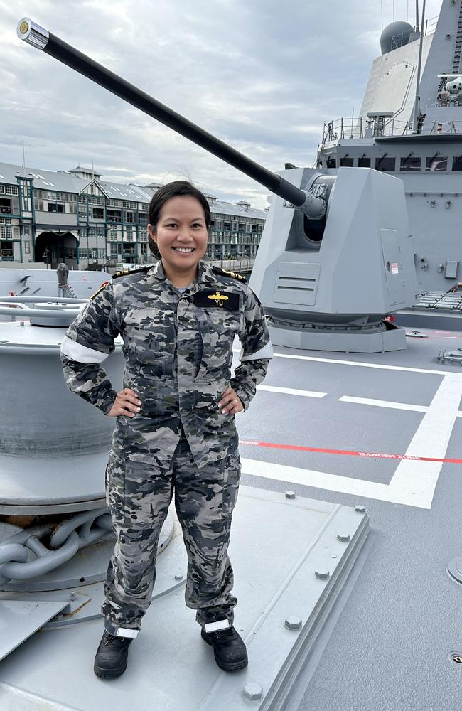 Royal Australian Navy Lieutenant Commander Louella Yu on the desk of HMAS Brisbane. Picture Charles Miranda