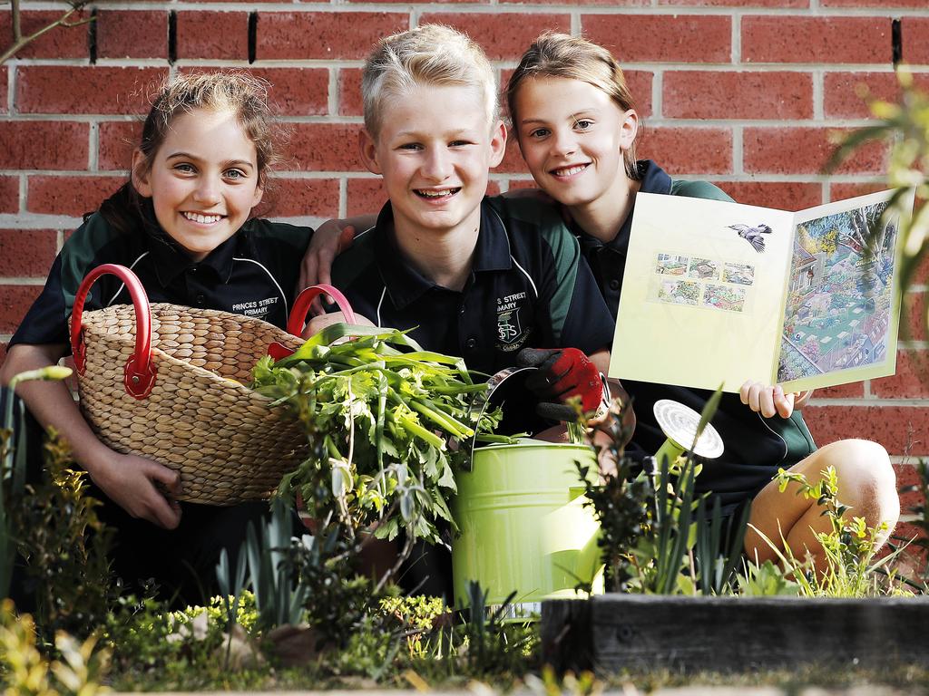 Students from Princes Street Primary School Zara Bury, 11, Tom Mansfield, 12 and Didi Walker, 11 in the schools garden as Stamp Collecting month is all about sustainable gardening. Picture: Zak Simmonds