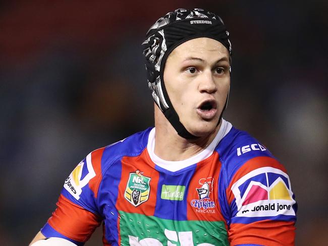 Kalyn Ponga of the Knights runs the ball during the Round 21 NRL match between the Newcastle Knights and the Wests Tigers at McDonald Jones Stadium in Newcastle, Friday, August 3, 2018. (AAP Image/Brendon Thorne) NO ARCHIVING, EDITORIAL USE ONLY