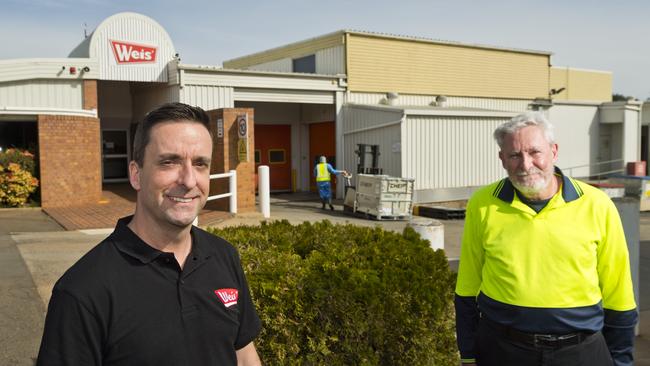 Weis factory director Keith Head (left) with logistics team leader Charlie Thorpe stand outside the manufacturing facility in Toowoomba as Unilever continue to wind down local production in the eventual move to New South Wales, Tuesday, July 21, 2020. Picture: Kevin Farmer