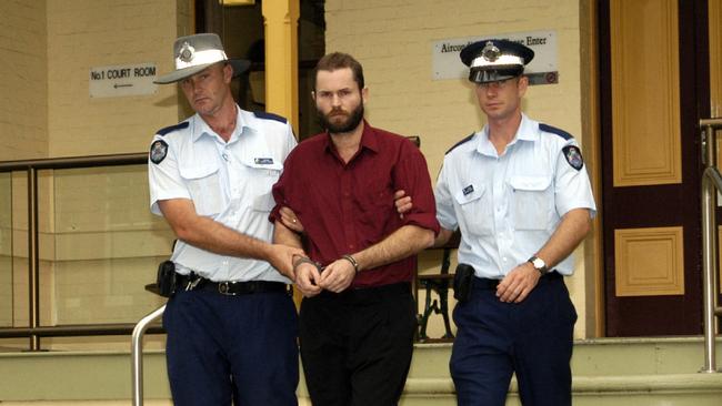 Hitman Michael John Kinsella (centre) pleaded guilty to the murder of Ingid Lester. PicJohn/Wilson - crime qld