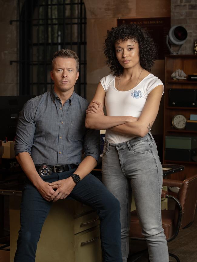 L-R: Todd Lasance as AFP Liaison Officer Sergeant Jim 'JD' Dempsey and Olivia Swann as NCIS Special Agent Captain Michelle Mackey in NCIS: Sydney. Photo: Daniel Asher Smith/Paramount+.