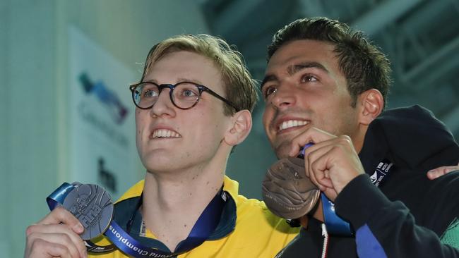 Horton shows off his silver medal alongside Italy’s bronze medallist Gabriele Detti. Pic: AP