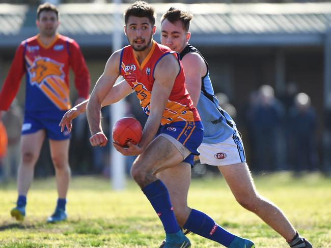 Maribyrnong Park star Robert Ball fires off a handball last season. Picture: James Ross