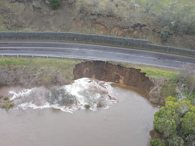 The Lyell Highway at Plenty has been reopened to one lane with traffic signals and workers on site while RoadsTas works on a plan to repair the road. Picture: RoadsTas