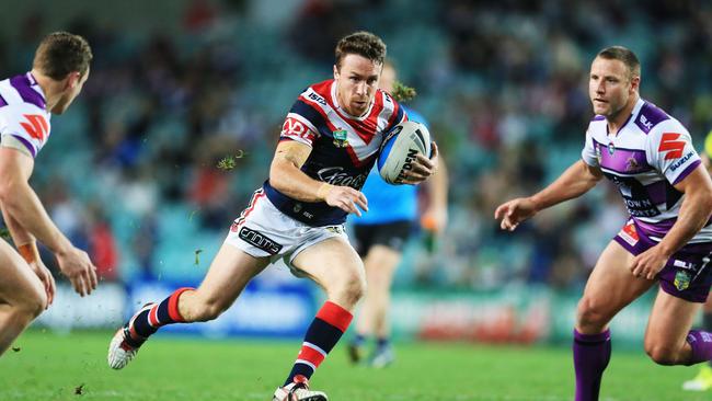 James Maloney of the Roosters finds a gap during the Sydney Roosters v Melbourne Storm NRL Finals series game at Allianz Stadium, Sydney. pic Mark Evans