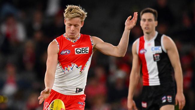 MELBOURNE, AUSTRALIA - JULY 07: Isaac Heeney of the Swans kicks the ball during the round 17 AFL match between St Kilda Saints and Sydney Swans at Marvel Stadium, on July 07, 2024, in Melbourne, Australia. (Photo by Morgan Hancock/AFL Photos/via Getty Images)