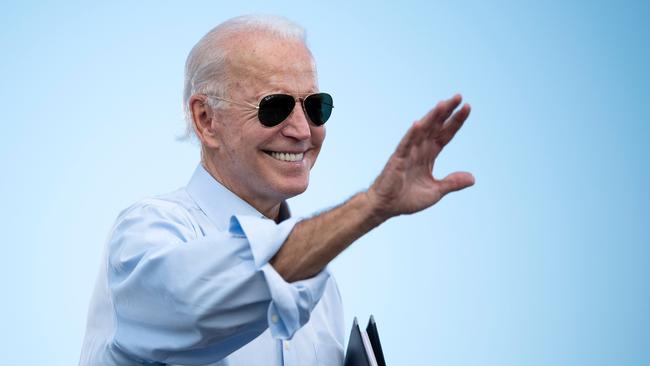 Democratic Presidential candidate and former US Vice President Joe Biden gestures prior to delivering remarks at a Drive-in event in Coconut Creek, Florida.