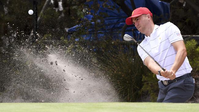 Justin Thomas hits a bunker shot during a practice round at Royal Melbourne. Picture: AFP