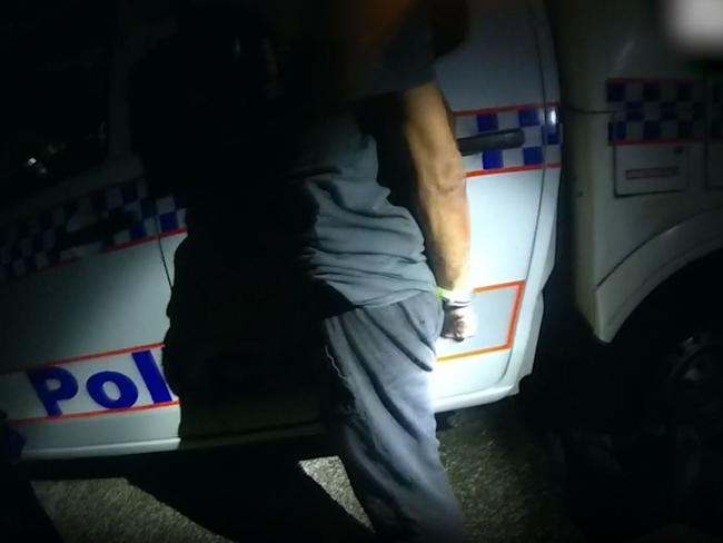 Troy Andrew Burns, 52, is arrested by police at the scene of an incident in Varsity Lakes during which a 15-year-old boy was stabbed. Picture: QPS