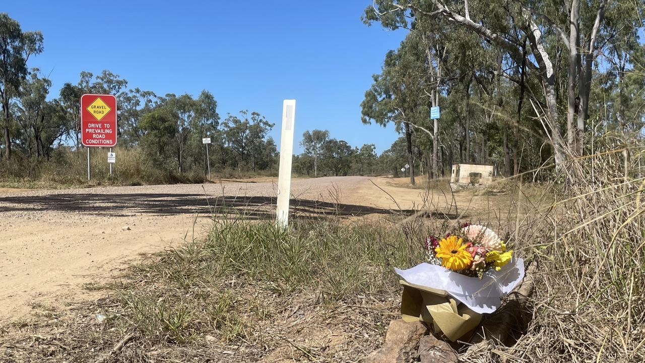 Flowers have been left on the roadside near the property involved in the fatal shooting on August 4, 2022. Picture: Daniel Shirkie