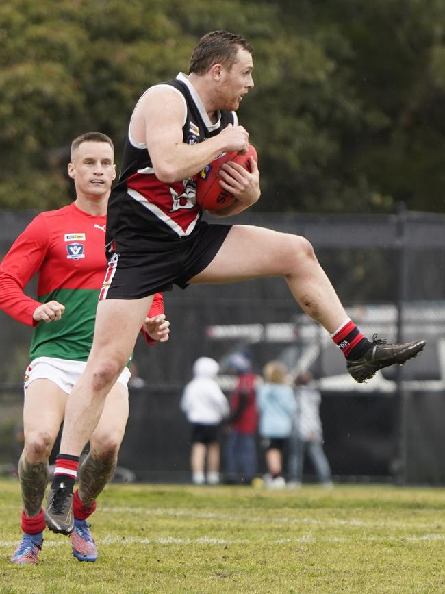 MPNFL: Lachlan Stenning marks for Bonbeach. Picture: Valeriu Campan