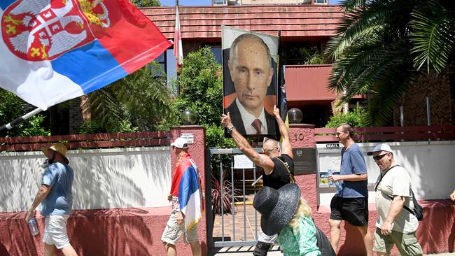 Pro Russian supporters walk past the Polish Consulate in Sydney. Picture: NCA NewsWire / Jeremy Piper