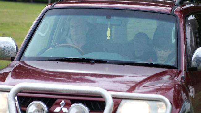 Col Crossman leaves the property with Darcy-Crossman’s three children. Picture: Marlon Dalton