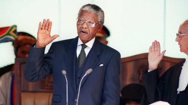 South African President Nelson Mandela takes the oath during his inauguration at the Union Building in Pretoria in 1994. Picture: AFP