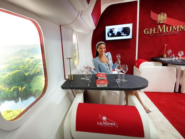 A private-jet themed dinner lounge in the Mumm marquee. Picture: David Caird